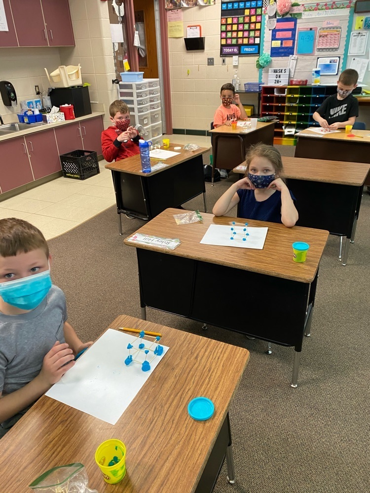 Students making cubes.
