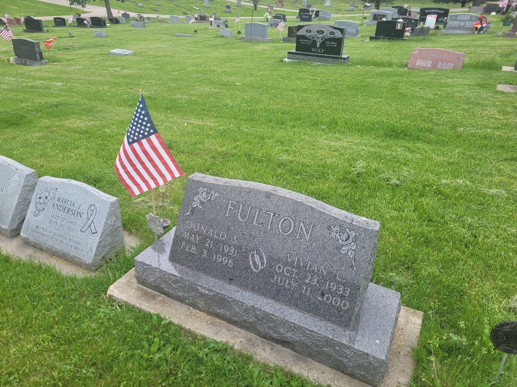 Donald Fulton head stone with flag at Grove Hill Cemetery